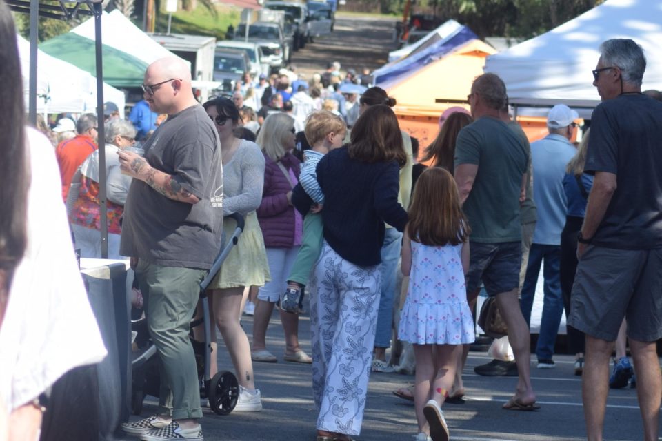 Saturday market in downtown Fernandina with vendors and shoppers